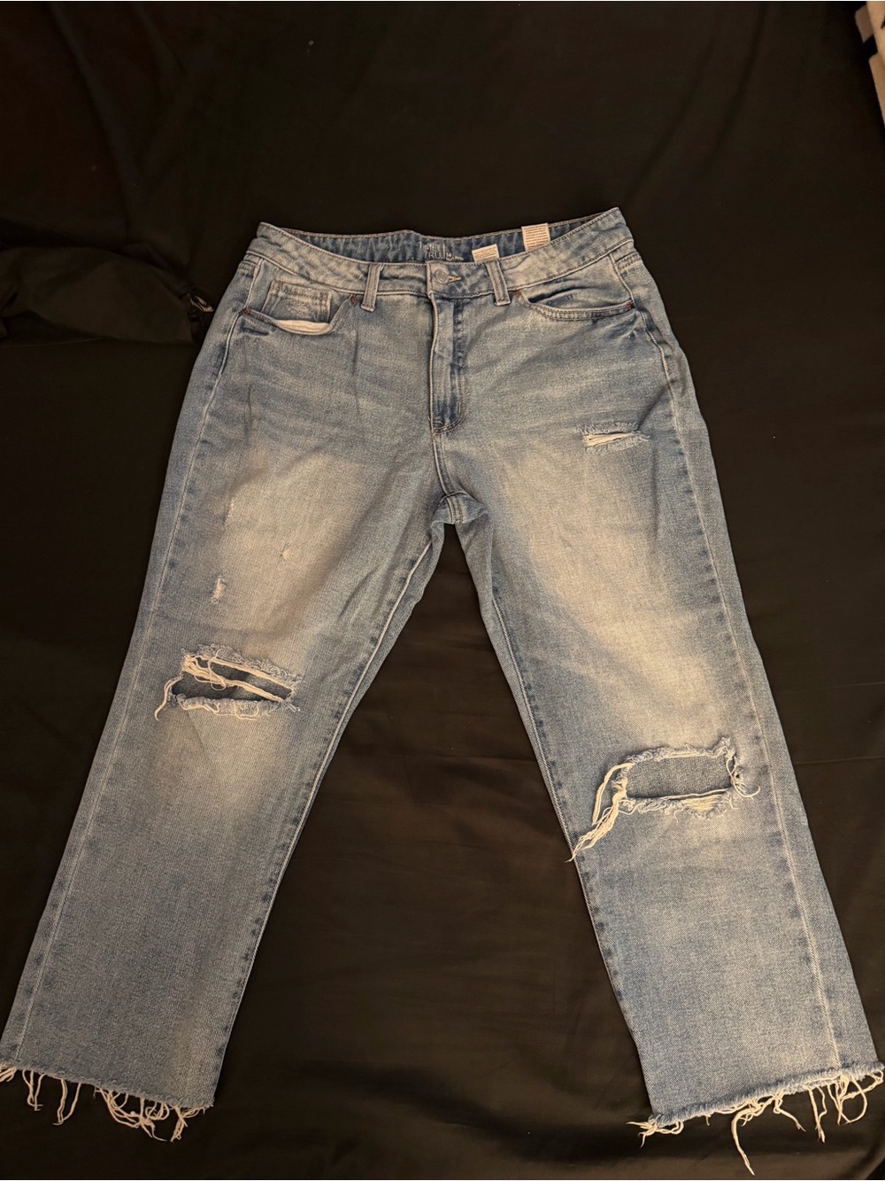 Women’s Time & Tru high rise light wash distressed jeans with raw hem size 14